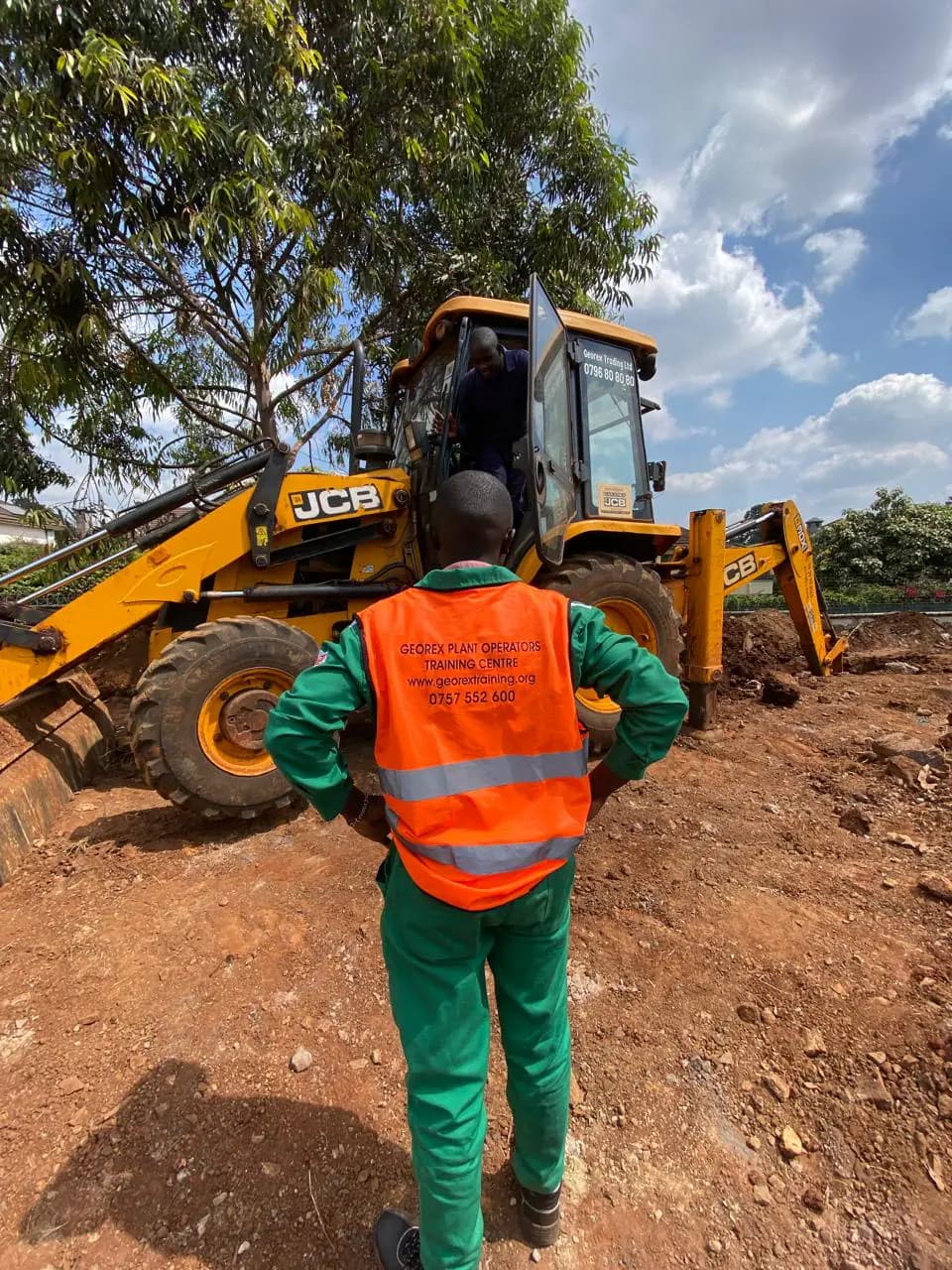 Georex trainee preparing for a practical backhoe session